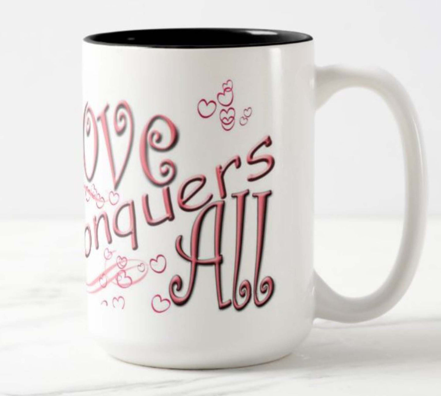 Mug with inspirational bible scripture "Love Conquers All' and flower image.