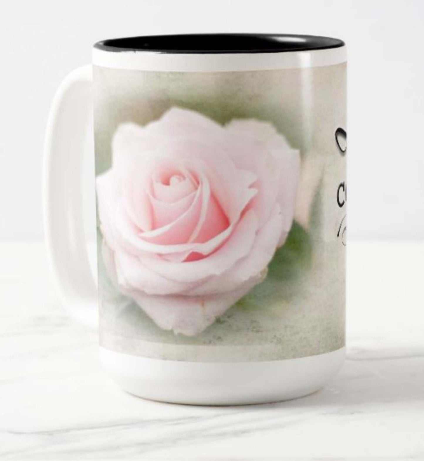Lovely 15 oz. mug with the inspirational bible scripture "Love Conquers All' and flower photo.