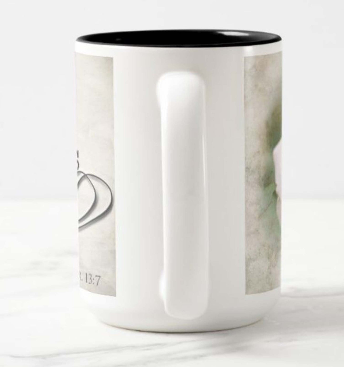 Lovely 15 oz. mug with the inspirational bible scripture "Love Conquers All' and flower photo.