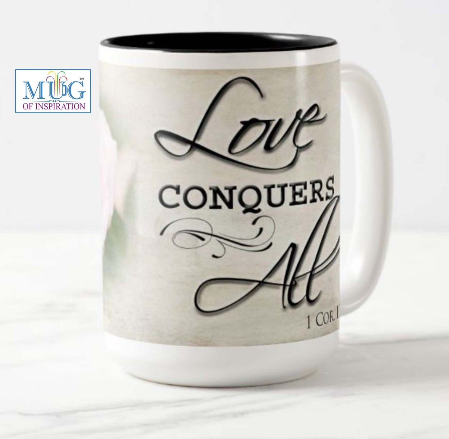 Lovely 15 oz. mug with the inspirational bible scripture "Love Conquers All' and flower photo.