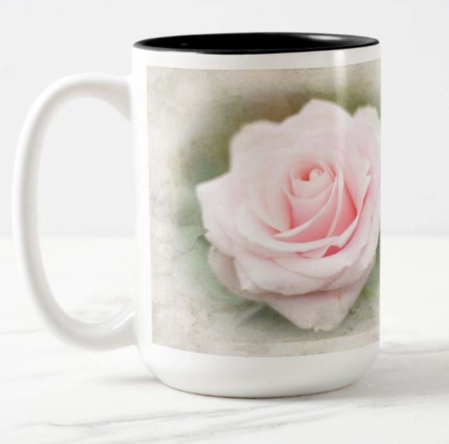 Lovely 15 oz. mug with the inspirational bible scripture "Love Conquers All' and flower photo.